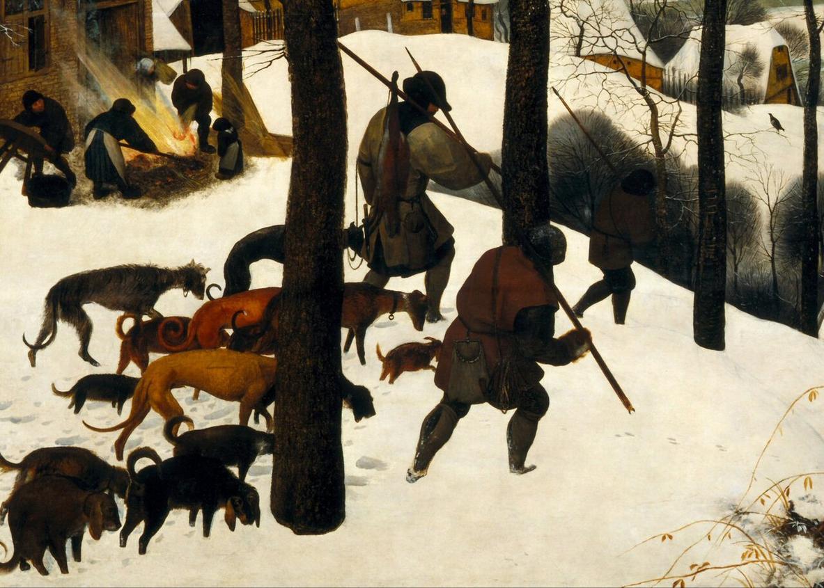 Close view of the three hunters returning through the snow with their dogs; one man carries a small fox