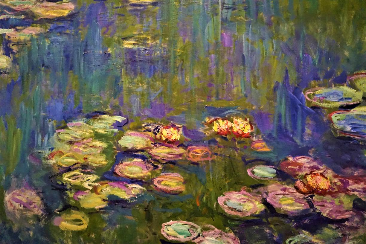 A separate Claude Monet Water Lilies painting, shown as a comparison; its lily pads and reflections also merge into a broad field of colour