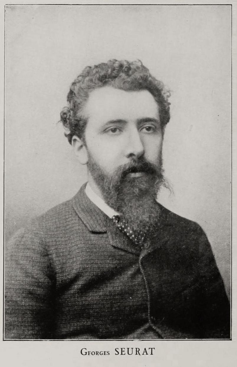 An 1888 portrait photograph of Georges Seurat, shown from the chest up.